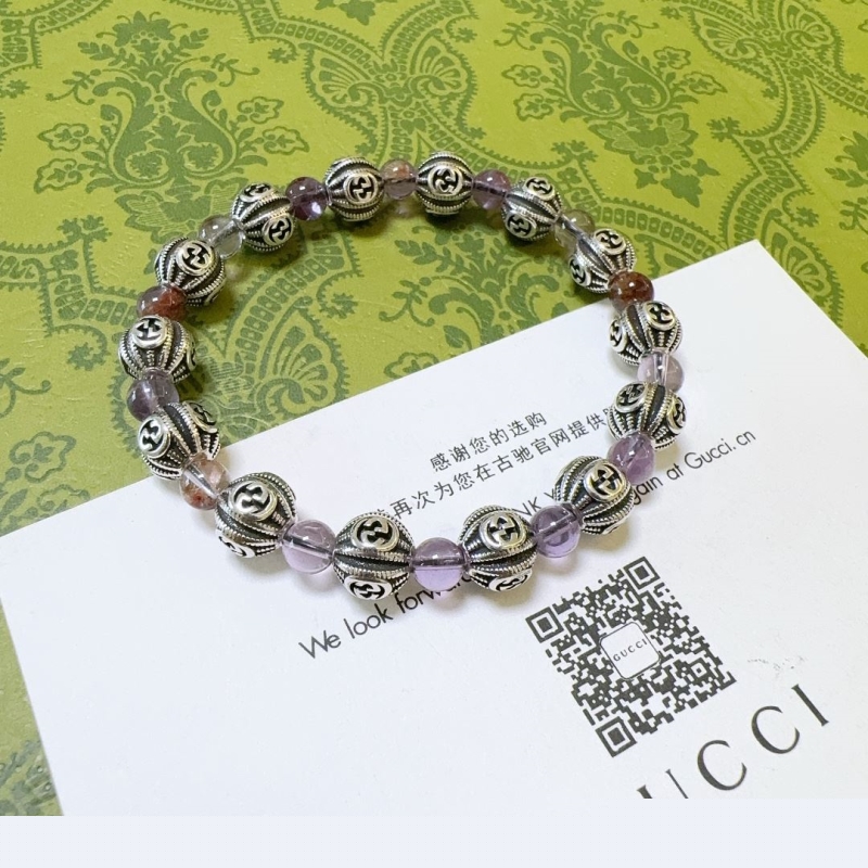 G*u*i bracelets